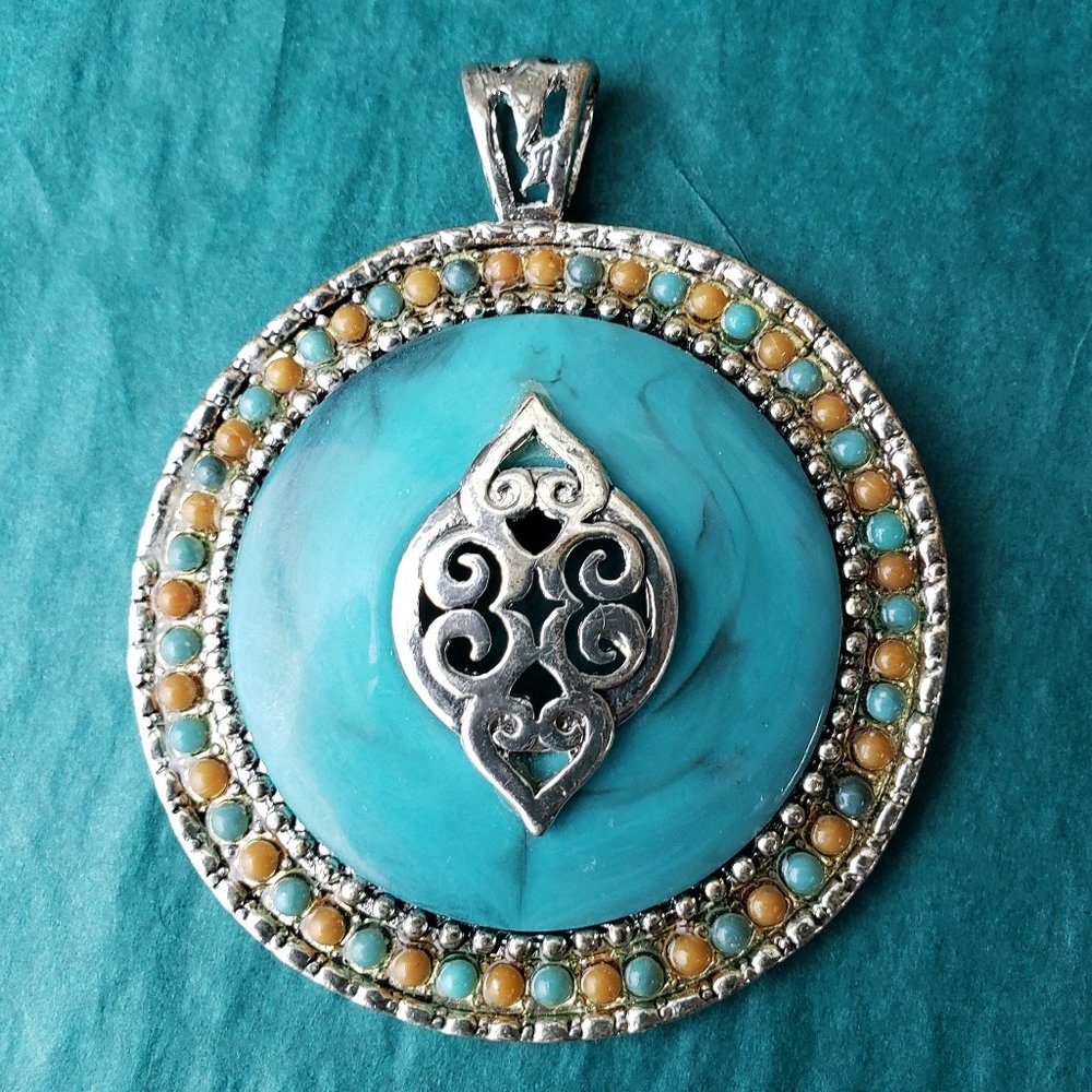 2/10$ Silver tone blue and orange pendant
